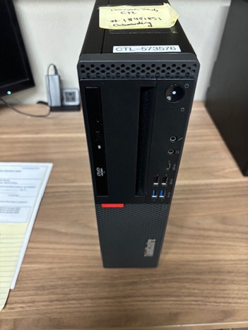 Black Lenovo desk top computer