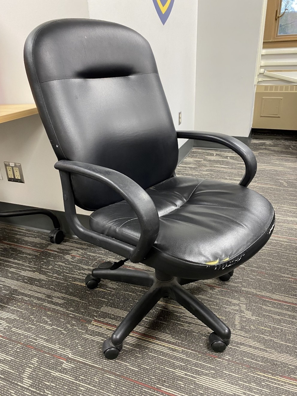 Black leather office chair, some wear on seat