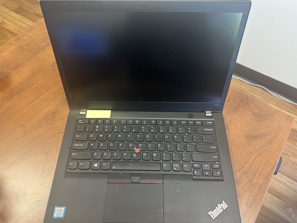 Black Lenovo laptop closed
