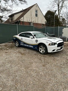 white dodge charger side university of windsor logos