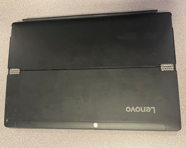 black lenovo laptop closed