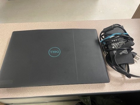 DELL LAPTOP BLACK CLOSED WITH POWER CABLE