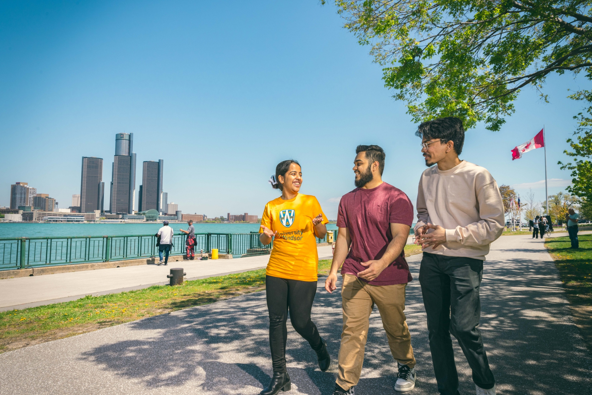Student walking at the riverside