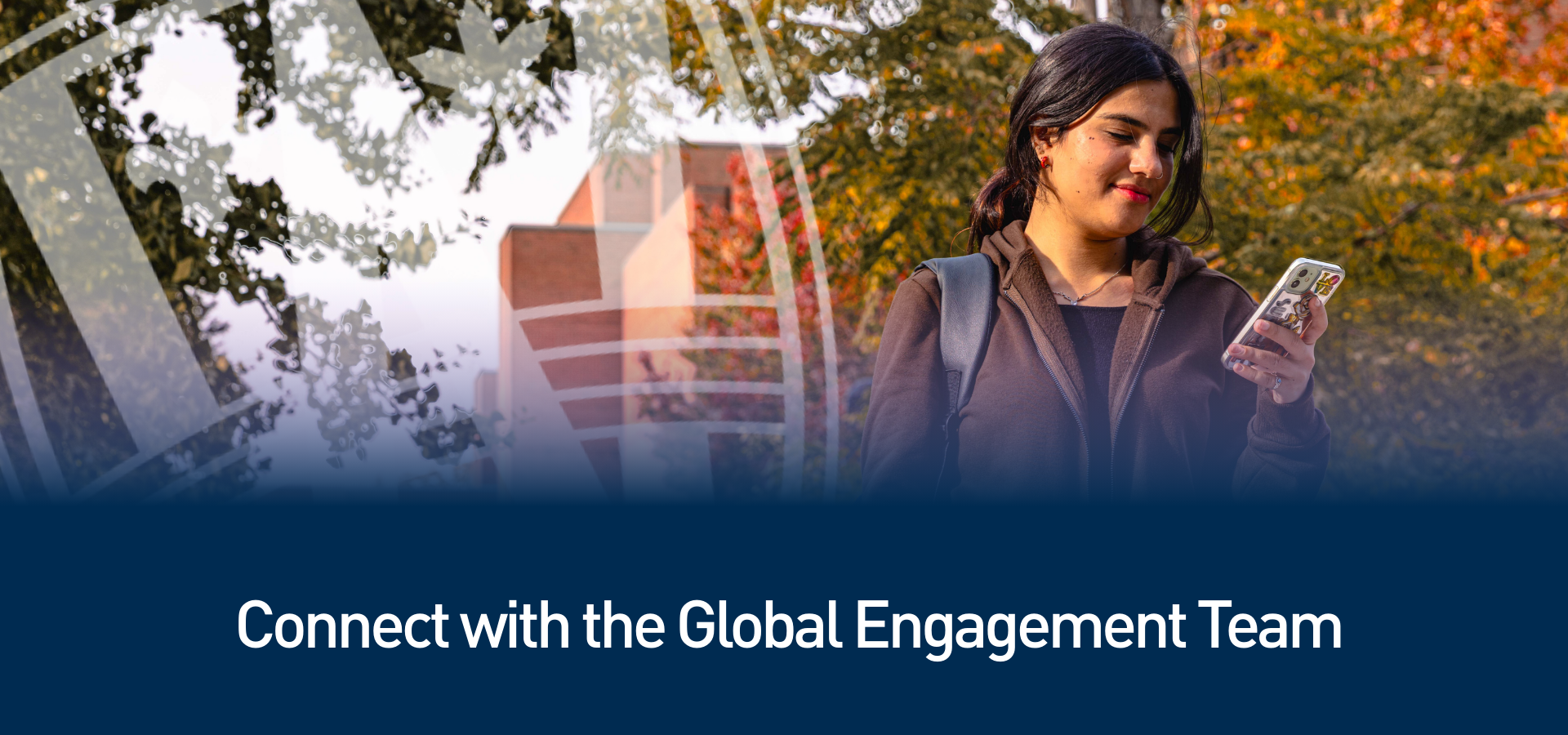 Student holding a mobile phone