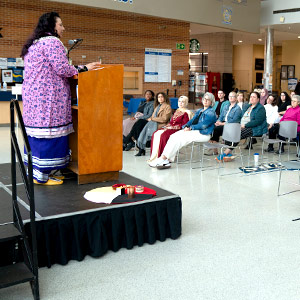 Indigenous leader speaking during Flag Raising Ceremony at CAW Student Centre