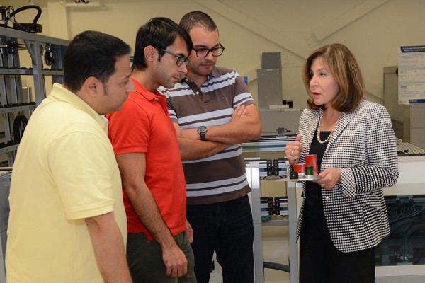 Engineering professor Hoda ElMaraghy (right) with students in the Intelligent Manufacturing Systems Centre.
