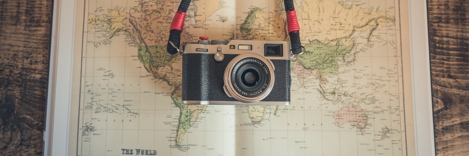 Photo of a map with a camera placed on top
