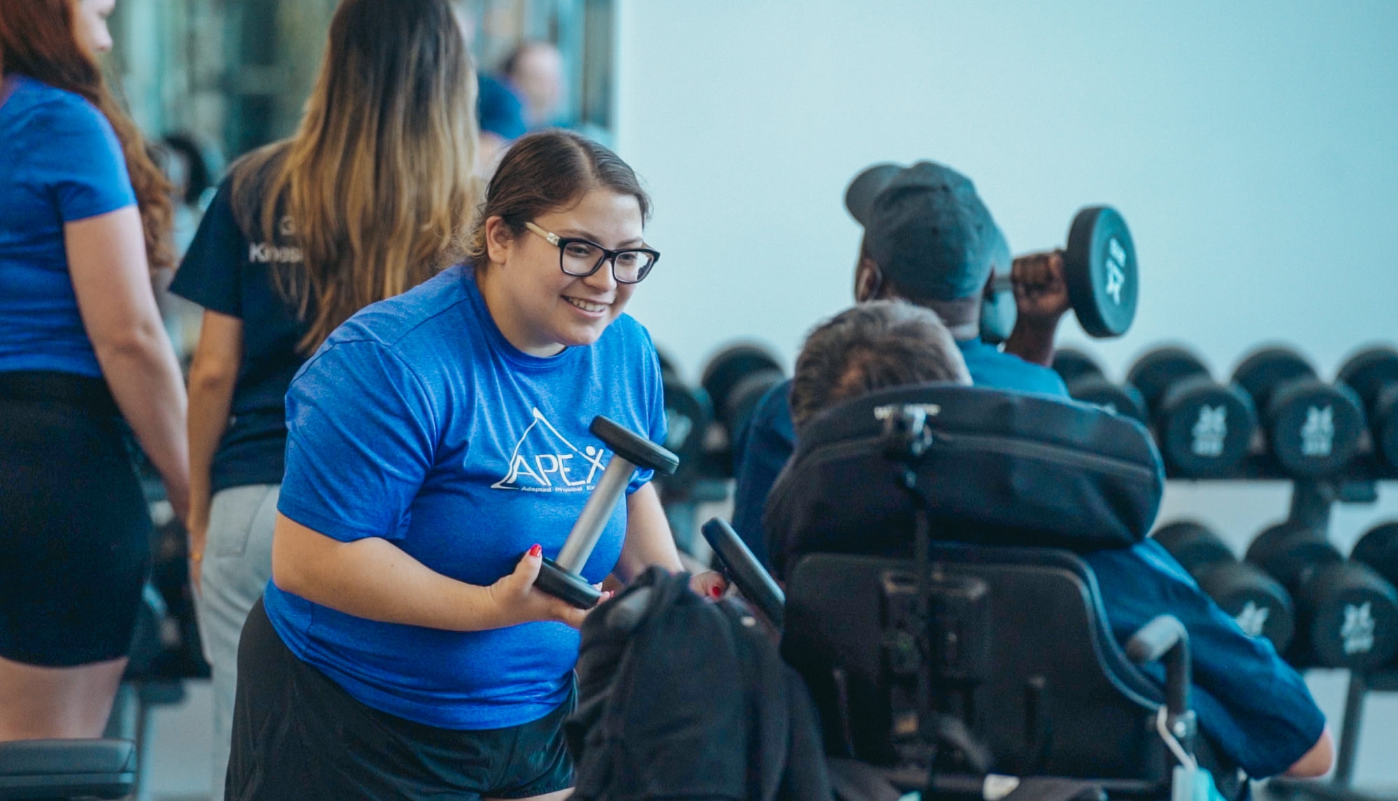 Community member in wheelchair working out in new Toldo Lancer Centre fitness centre