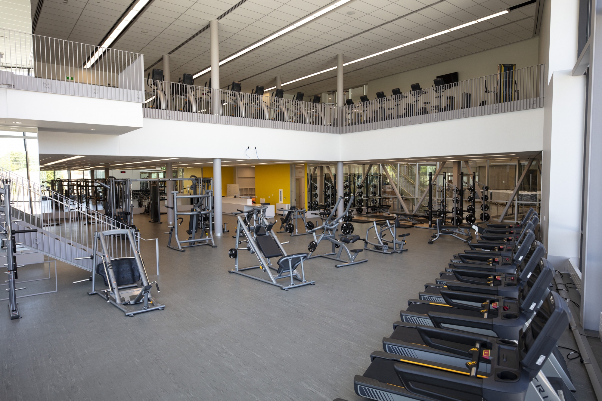 Room shot of the new Toldo Lancer Fitness Room with various cardio and strength equipment 