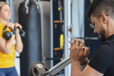 Two students in a group fitness class