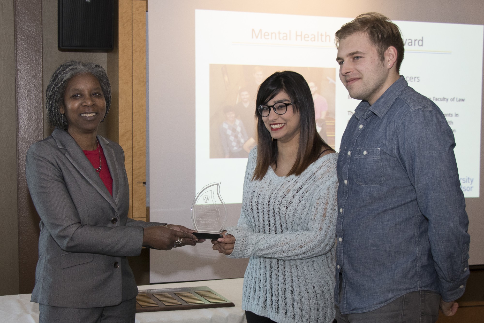Kaye Johnson and Snake and Lancers representatives Fatima Qamar and Teddy Weinstein