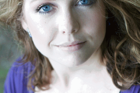 Soprano and UWindsor Alumnus Erin Armstrong conducts the Windsor Community Choir