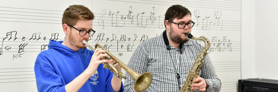 Music students play duet in one of the SoCA Armouries' classrooms