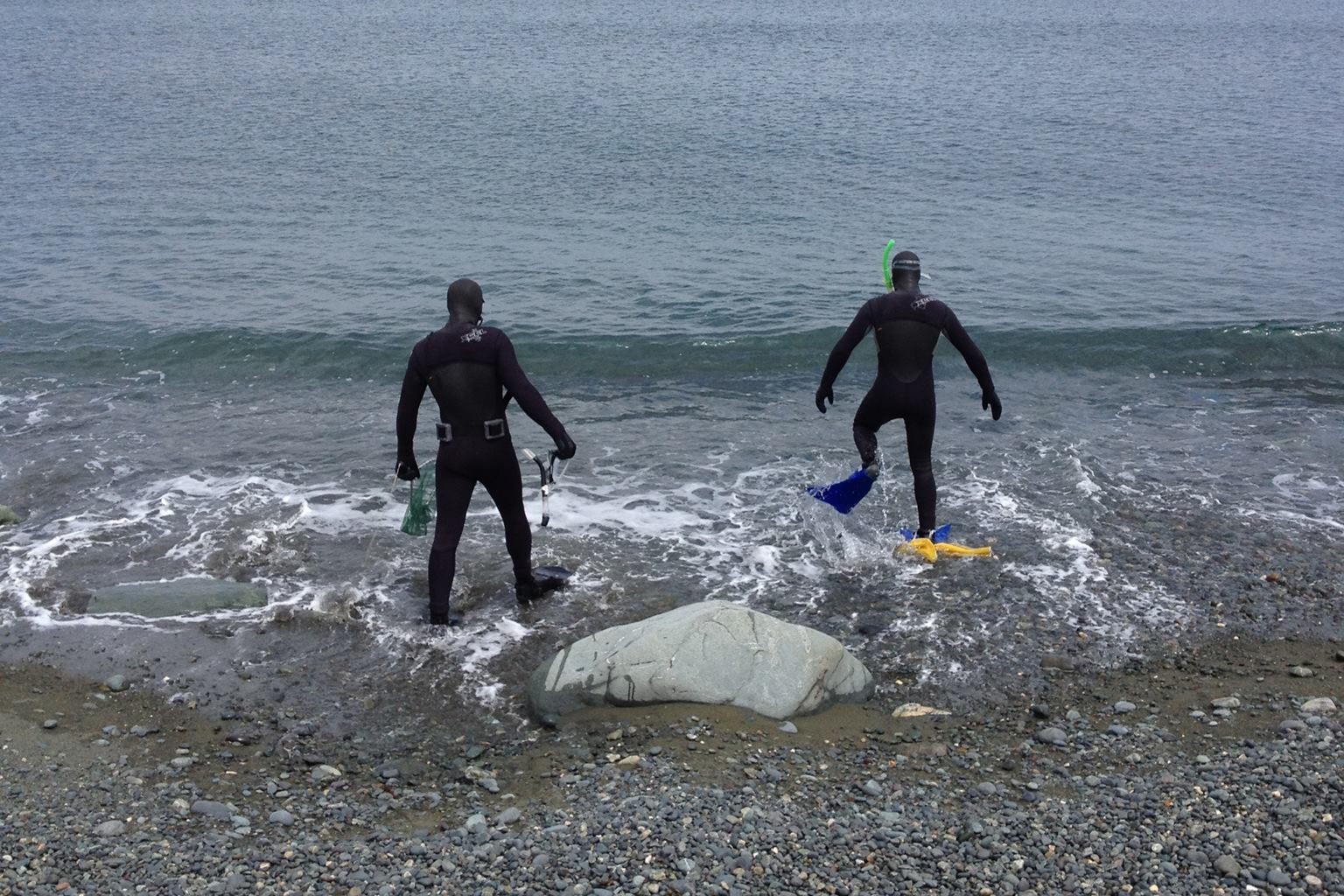 Anthony Bain and his brother in wetsuits