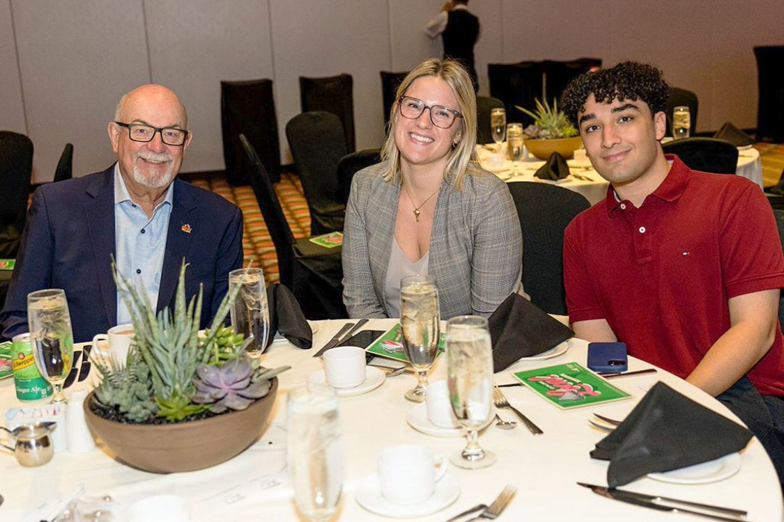Adrian Yonan, Tecumseh Mayor Gary McNamara and communications officer Mackenzie Vandenberg