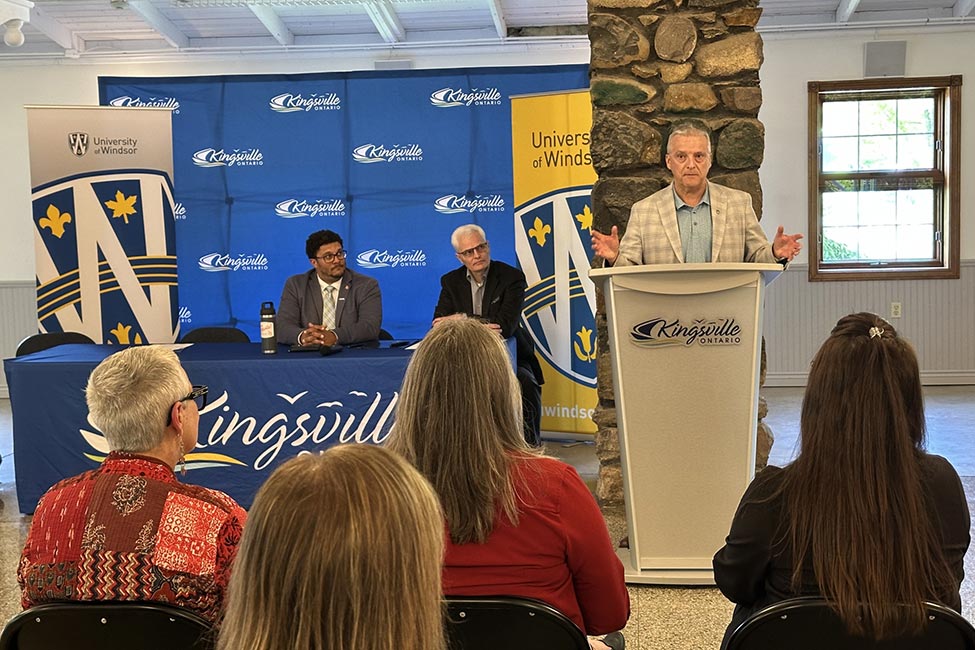 Dr. Gordon at the podium during the MOU signing ceremony