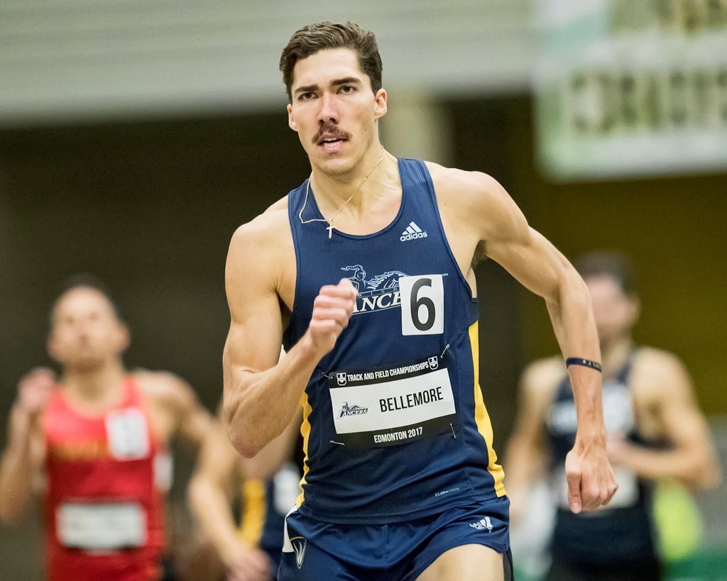 Corey Bellemore running track for the Lancers