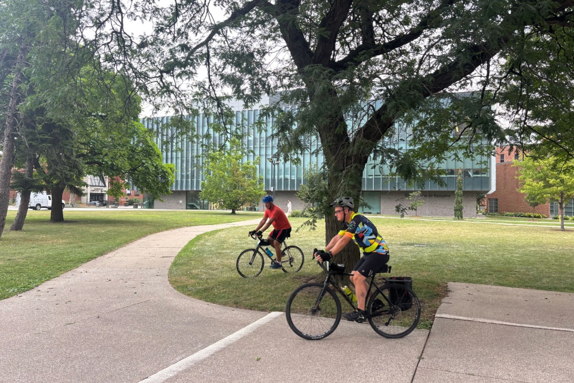 Cyclists leaving from campus for the Great Waterfront Trail Adventure