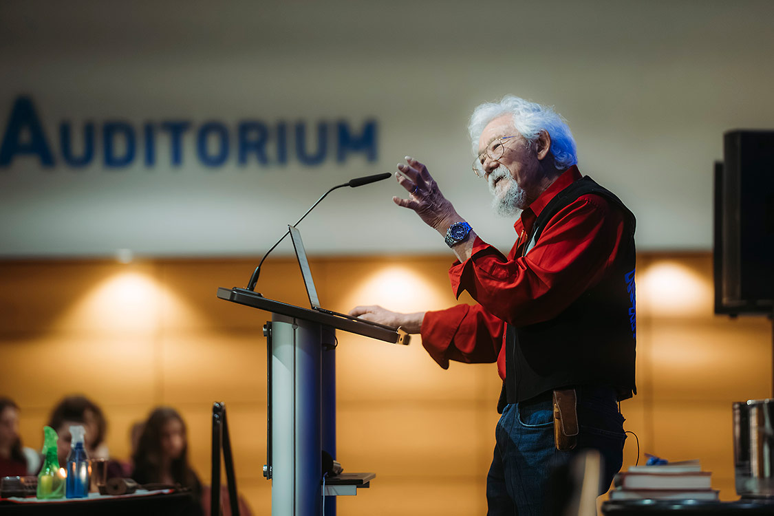 David Suzuki address an audience in Alumni Auditorium.