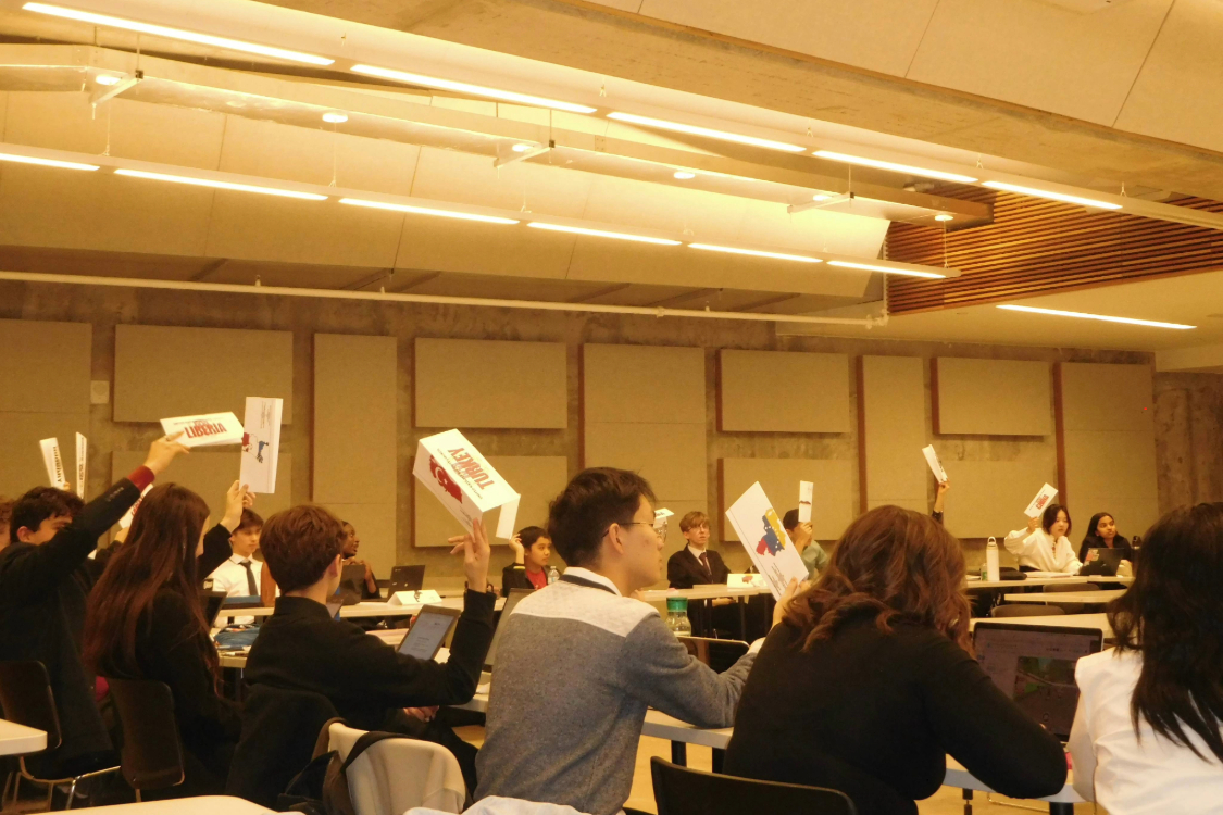 High school delegates voting on motions