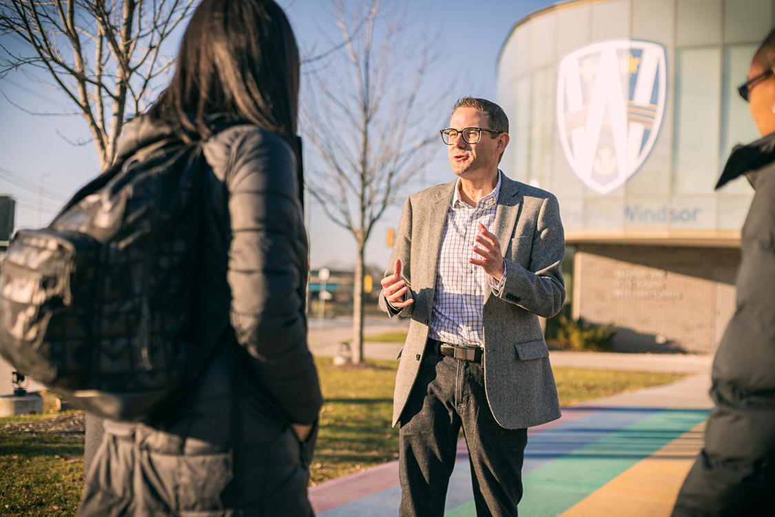 Kyle Asquith speaking to students