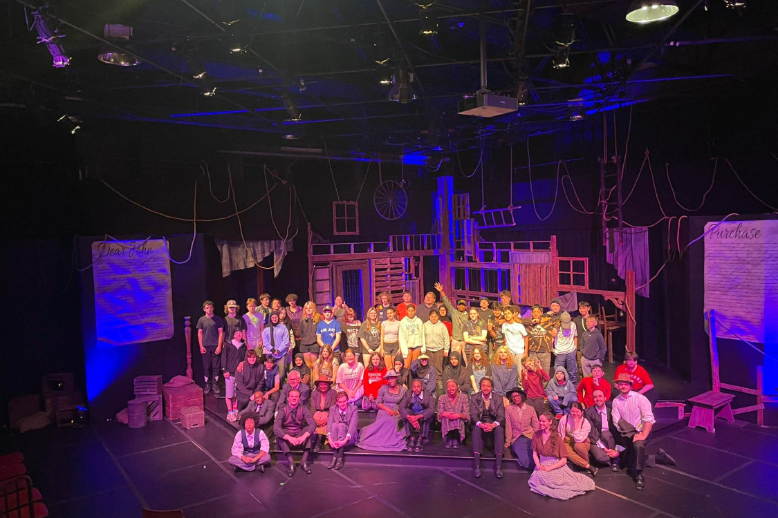 Students from Ford City Public School with the cast of the Price of Freedom