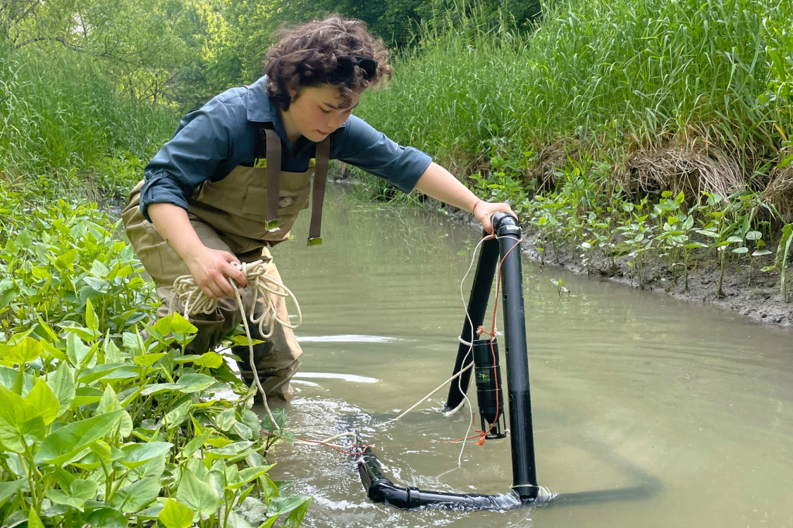 Avery Ng doing field work in River Canard