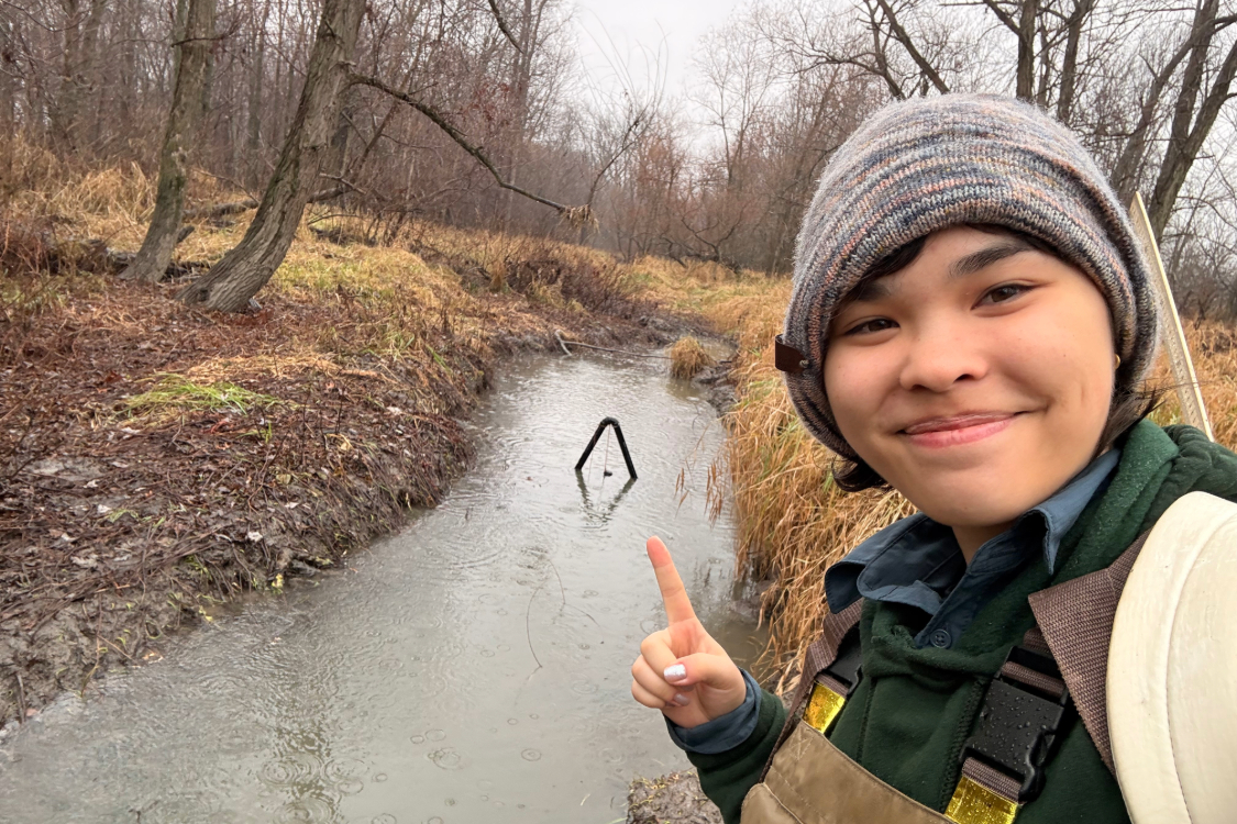 Avery Ng pointing to River Canard
