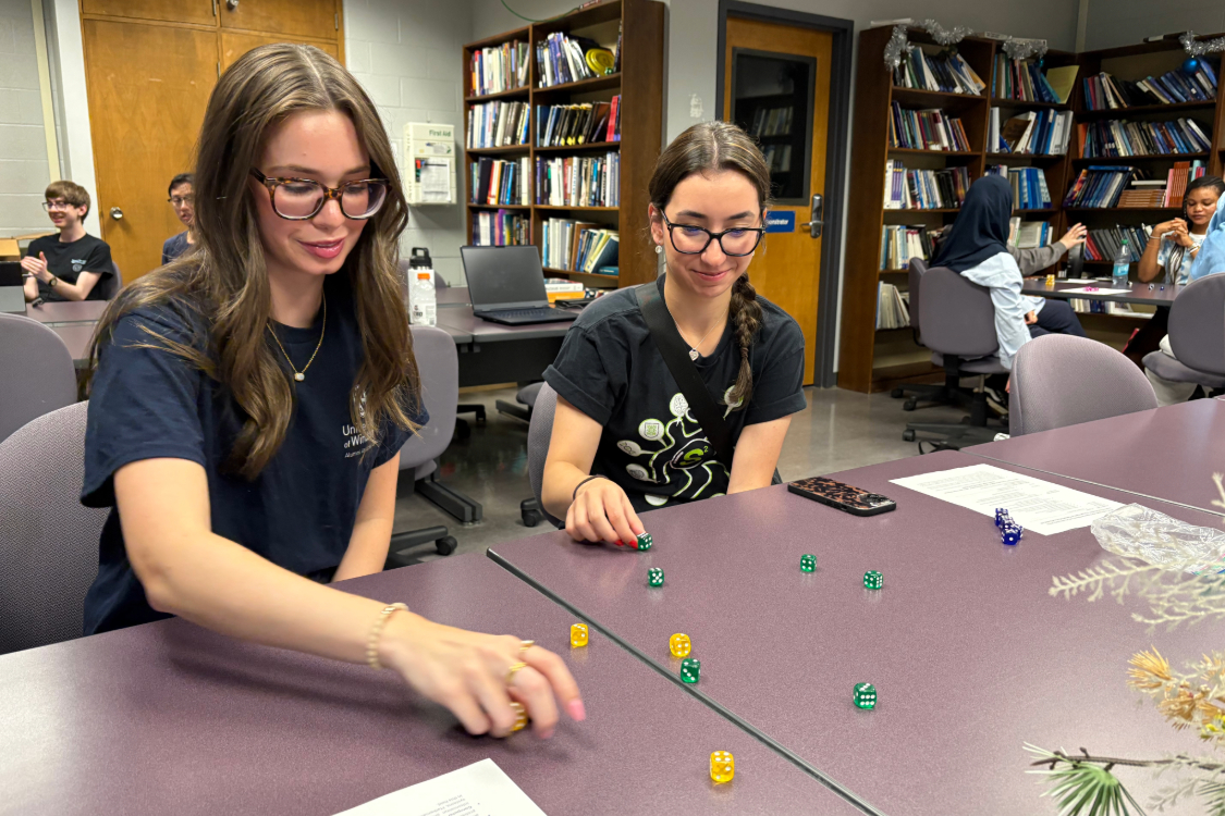 Students playing with dice