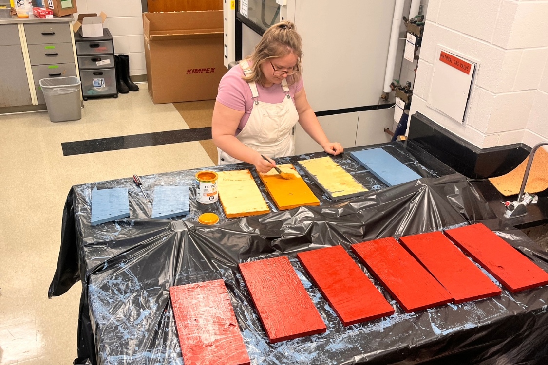Patricia Rokitnicki painting bird boxes