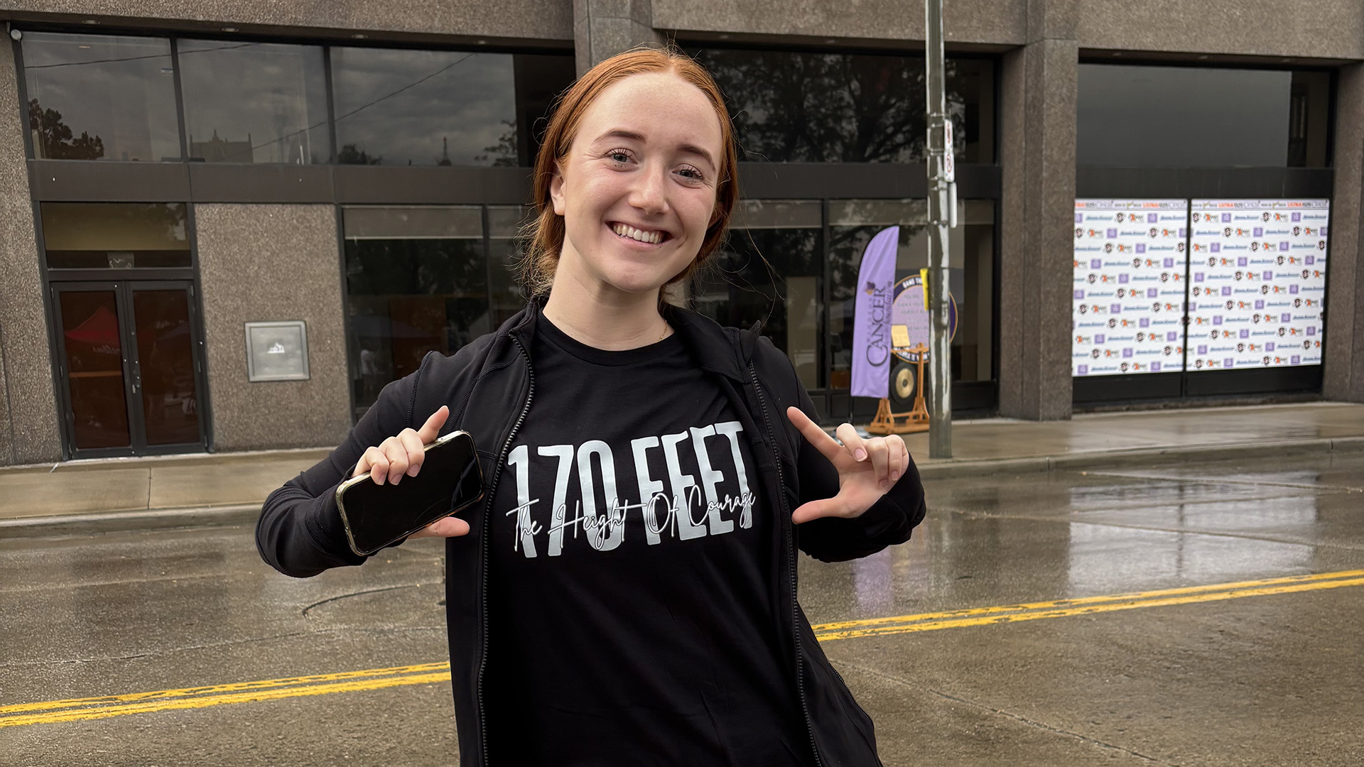 Kaitlyn Ferraro celebrates descending 170 feet from top of CIBC Building.