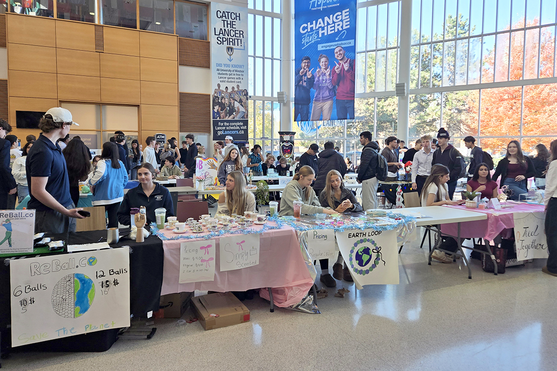 High school students exhibit their wares during Market Day