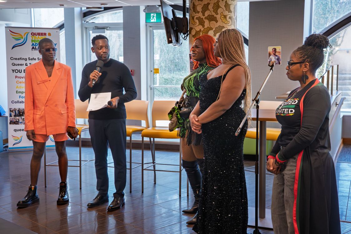 Anold Mulaisho, Dr. Carlo Handy Charles, drag performers Valentina Rosé and Baddie Brooks, and Dr. Camisha Sibblis