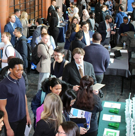 Students and employers at job fair in the Odette Dividends