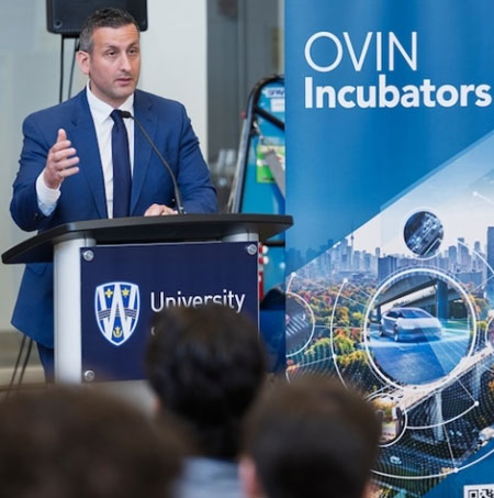 Head of OVIN Raed Kadri speaks to the crowd at the University of Windsor and OVIN Incubators partnership launch