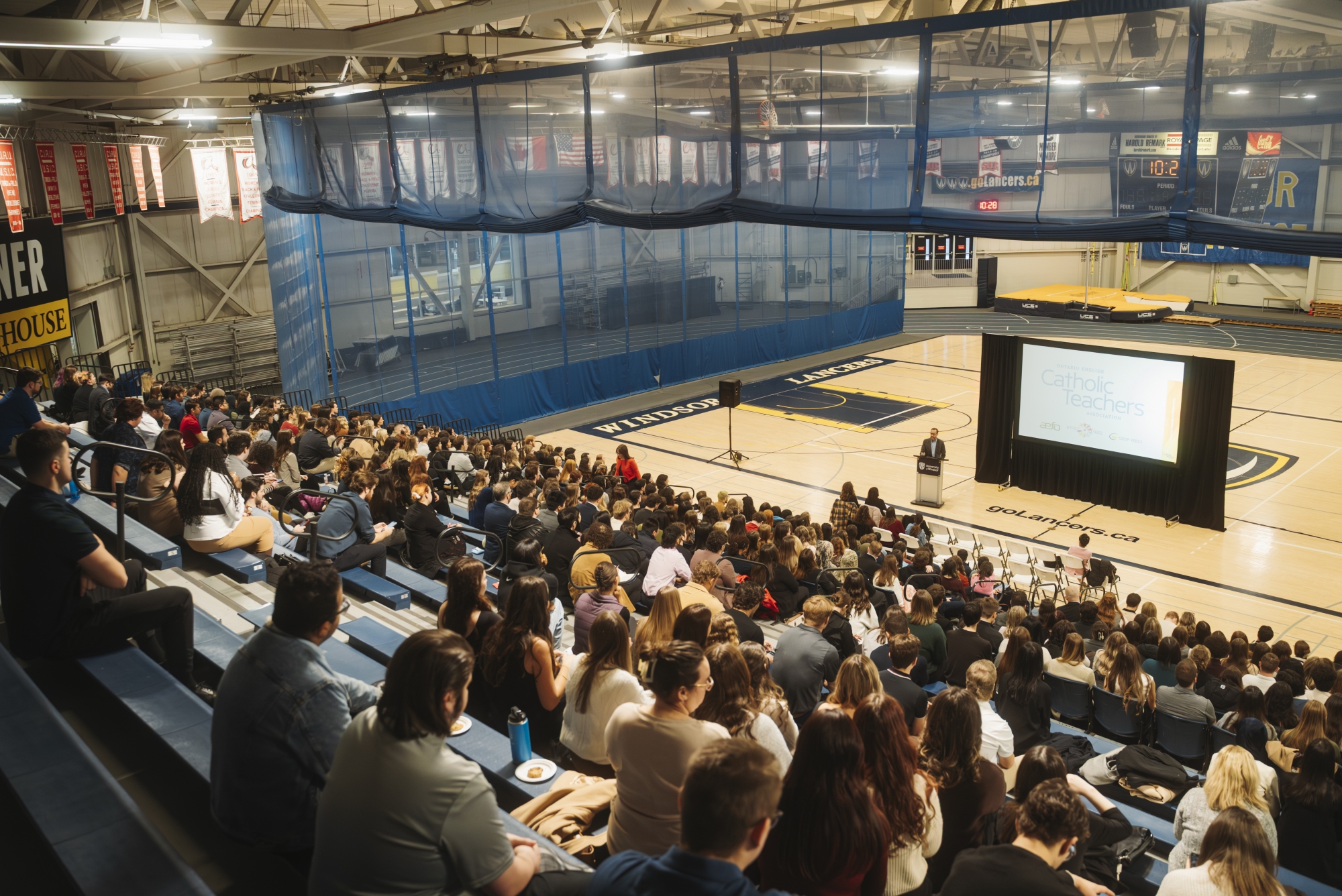 Hundreds of students in the Dennis Fairall Field House for the OTF Pinning ceremony