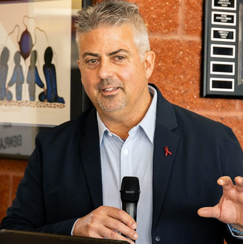 Dr. Sean Rourke at podium