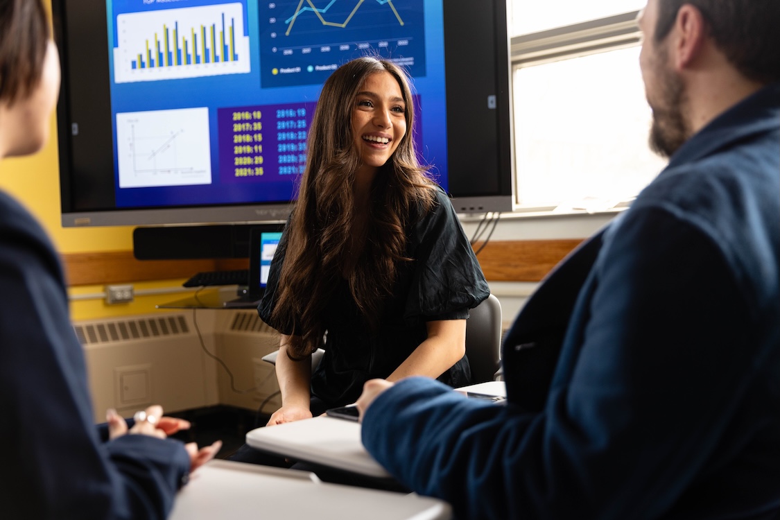 Three students sitting