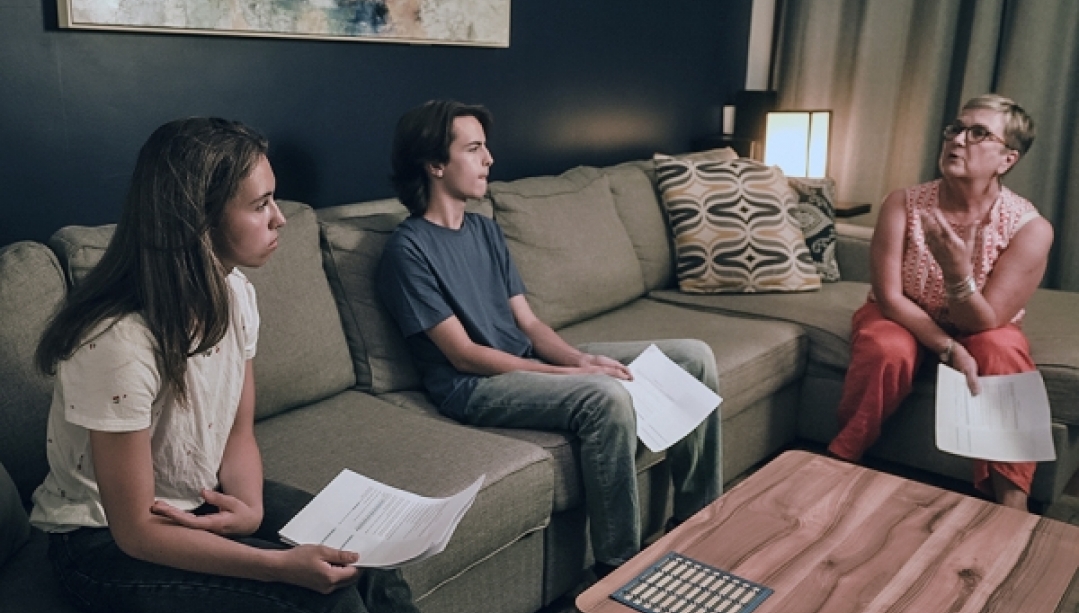 Olivia Sasso and Ewen Van Wagner review script with Charlene Senn