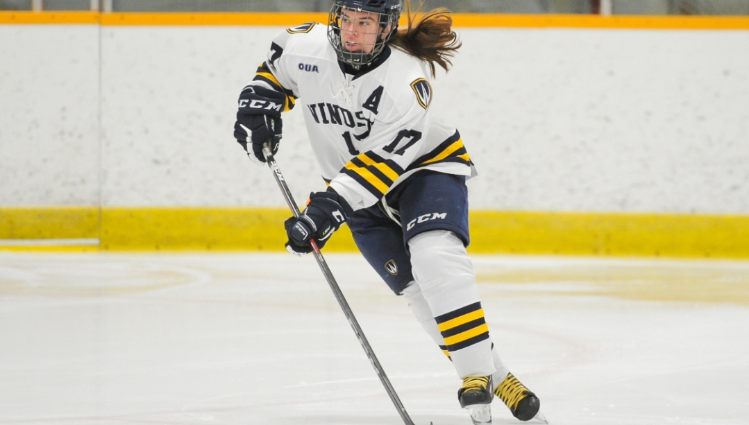 Amy Maitre playing hockey