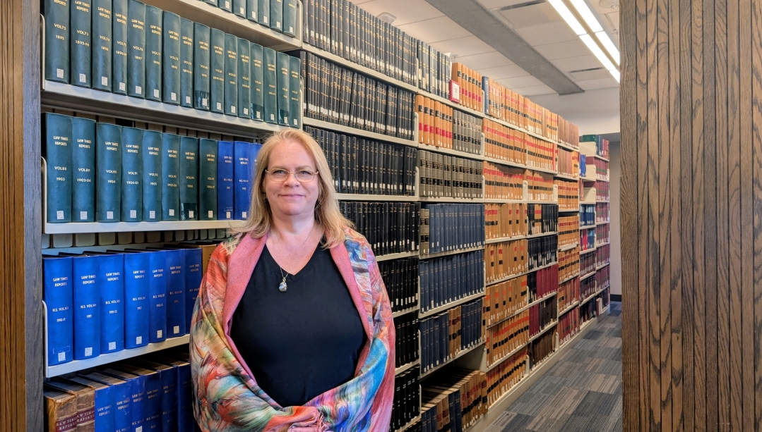 Annette stands in the UWindsor law library