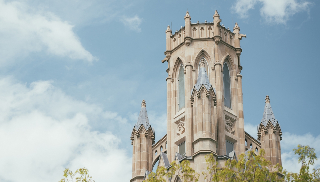 Photo looking skyward towards Dillon Hall peak. 