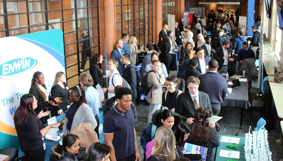 image of students and employers at job fair