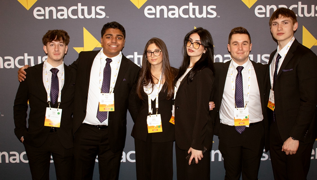 Photo fo Enactus Windsor team members at awards ceremony