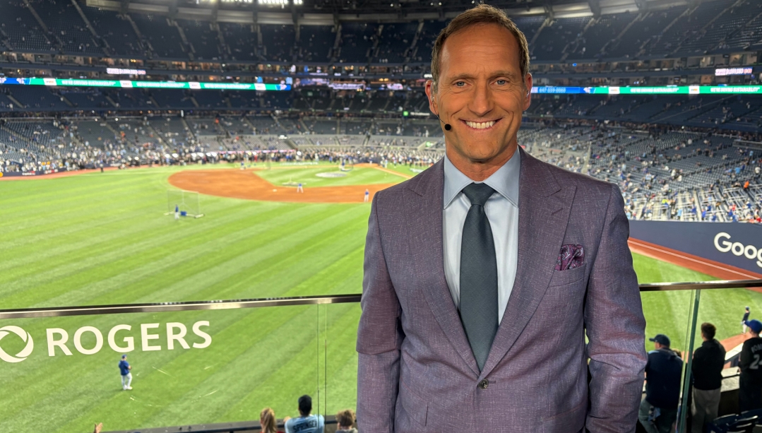 Joe Siddall (BHK ’07) stands at Rogers Centre in Toronto, where he now shares expert analysis as a Sportsnet broadcaster. The former catcher and UWindsor grad brings decades of on-field experience to the broadcast booth, offering fans insight into the str