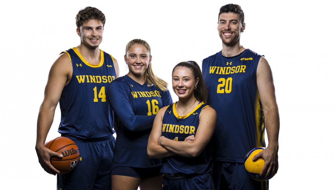 Lancers athletes posing together.