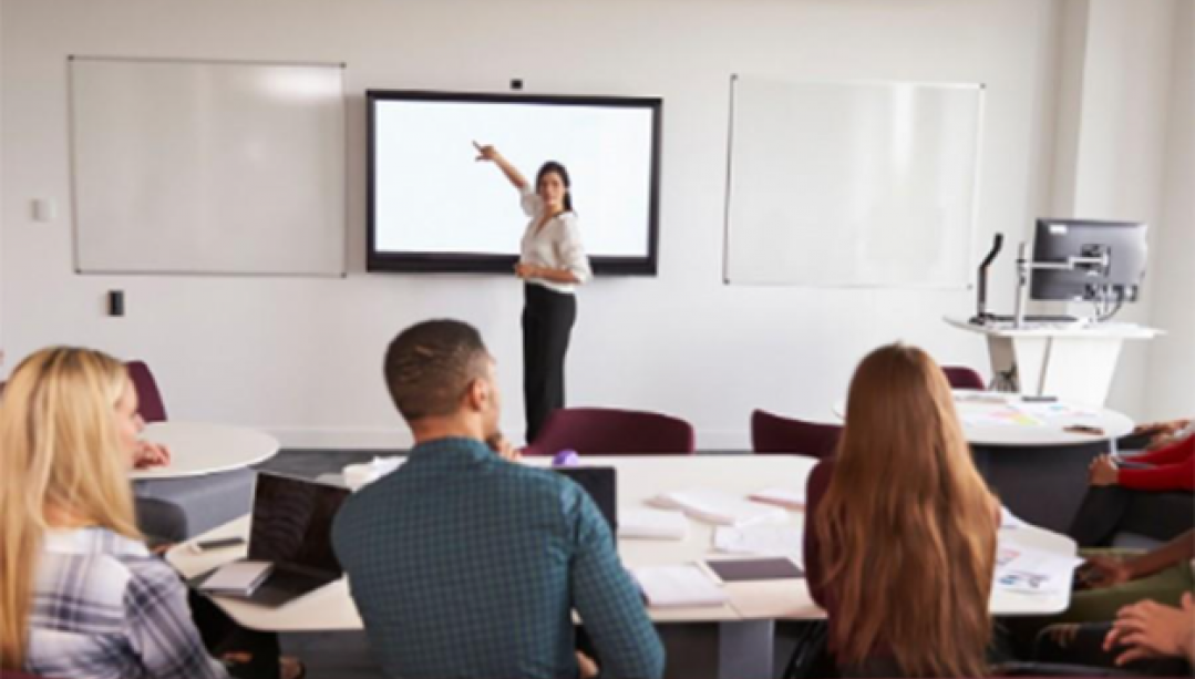 Professor in lecture hall teaching students