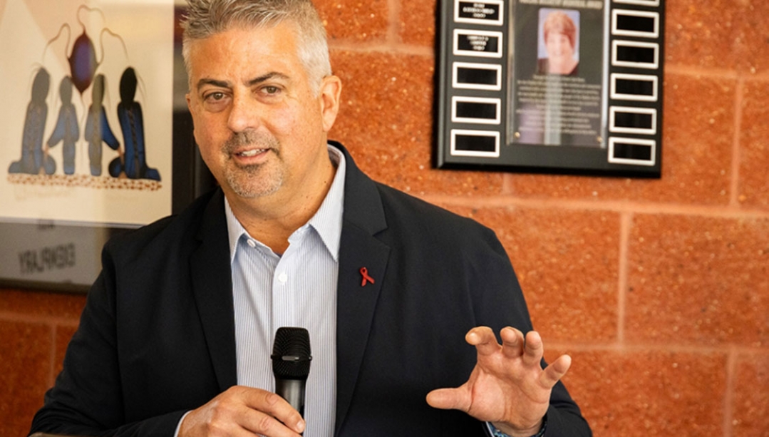 Image of Dr. Sean Rourke speaking to audience