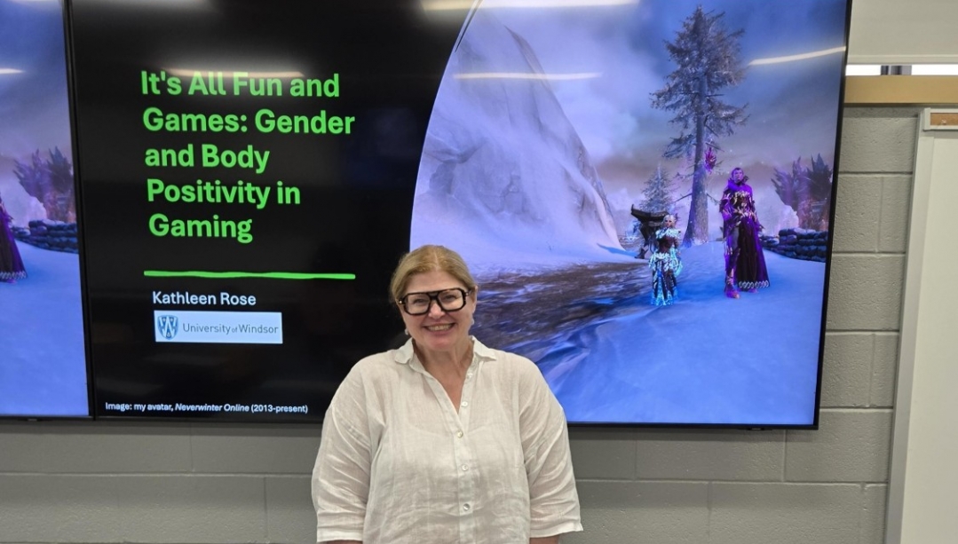 Kathleen Rose in front of her thesis defense presentation