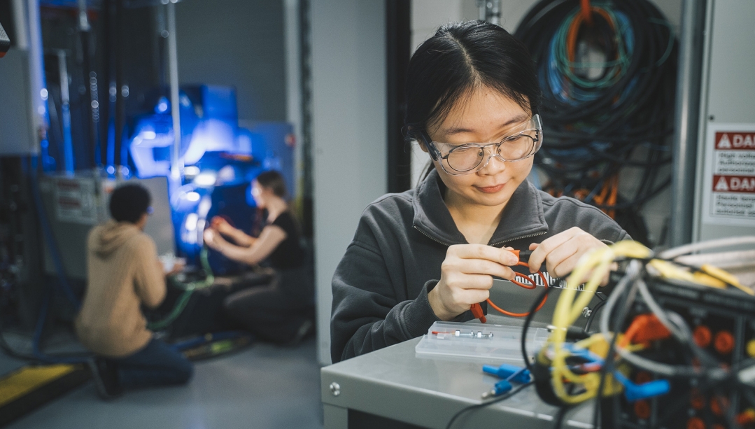 Engineering student working in tech lab.